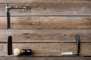 Brush on wooden boards background