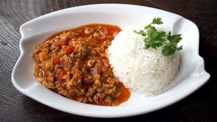 Fried pork with tomato sauce. Eggs bomb,cooking Thai Food.