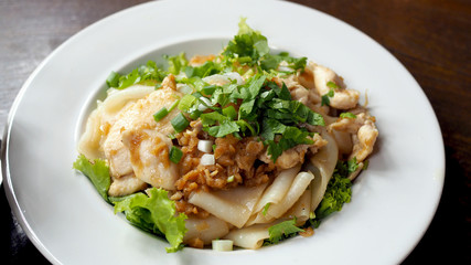 Fried Noodles with Chicken. Stir fried Chicken Noodles and egg. Thai food.