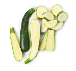 Fresh sliced zucchinis on white background