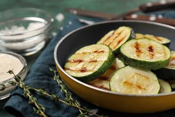 Tasty grilled zucchini on frying pan