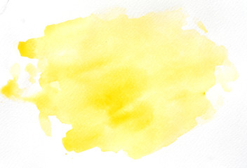 Abstract yellow watercolor background on white