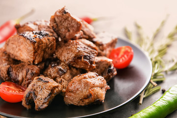 Delicious shish kebab on plate, closeup