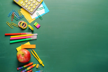 Set of school stationery on color background