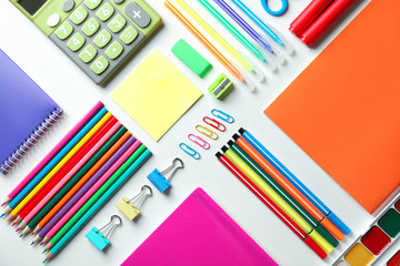 Fototapeta premium Composition with different school stationery and calculator on white background