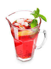 Jug with fresh raspberry lemonade on white background