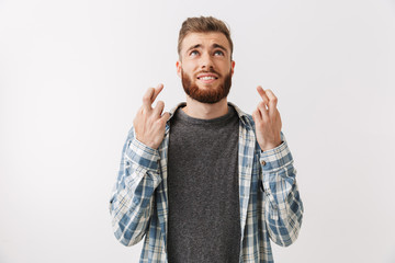Portrait of a worried young bearded man