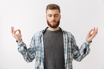 Naklejka premium Portrait of a calm young bearded man