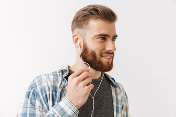 Portrait of a smiling young bearded man