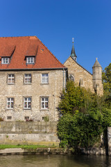 Fototapeta na wymiar Historic house at a canal in Hildesheim, Germany