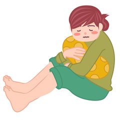 クッションを抱いて悩む女の子