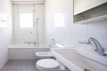 Fototapeta na wymiar Bathroom with tiles and window, vintage