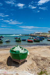 Enchanted sea. Boats in the bay of the abbey of San Vito