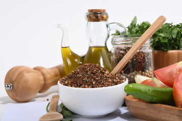 Picture of spices with vegetables bread and olive oil