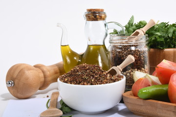 Picture of spices with vegetables bread and olive oil