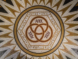 Mosaic in the abbey of Dormition (Church of the Cenacle), saying "One and only trinity" on mount Zion, Jerusalem, Israel.