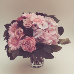 Bouquet flowers in vase, vintage look