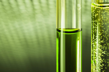Green liquid chemical weapon in glass tubes.