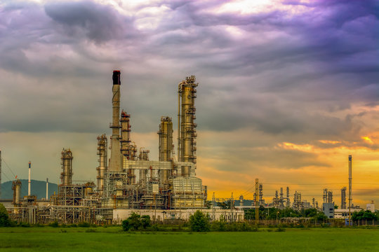 Oil and gas industry - refinery at sunset - factory - petrochemical plant