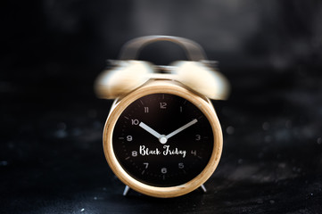 Black friday sale word on retro alarm clock