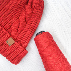 tangles with a knitting thread on a table