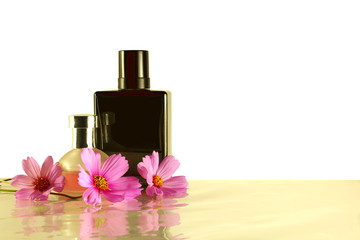 aromatic Essential oil perfume bottles with flower for cosmetics spa health nature concept 