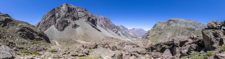 Andes valleys inside central Chile at Cajon del Maipo, Santiago de Chile, amazing views over mountains and glaciers a perfect place for hiking and having some adventure on a remote place