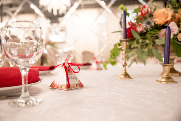 table decor for wedding ceremony, table setting, flowers, red and white decor