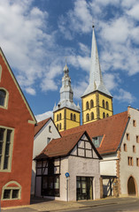 Fototapeta na wymiar Old houses and church towers in Lemgo, Germany