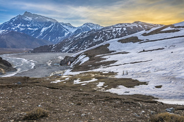 Thermal waters at Termas del Plomo inside Central Andes mountains. Just an amazing view of reflections and colors from the dawn and and an alpine view over the high Andes valleys, Santiago de Chile