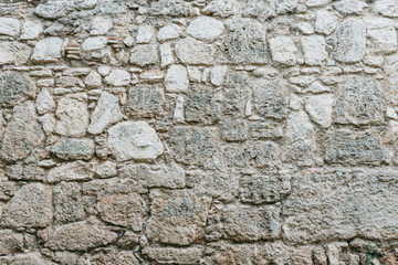 Gray stone wall. Stone texture