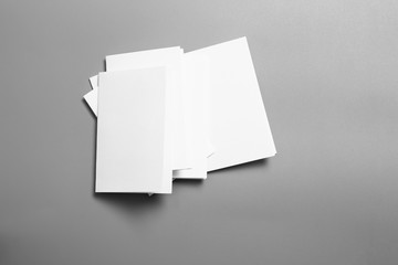 Blank portrait mock-up paper. brochure magazine isolated on gray, changeable background / white paper isolated on gray