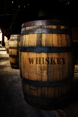 Whiskey aging in old wooden barrels