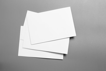 Blank portrait mock-up paper. brochure magazine isolated on gray, changeable background / white paper isolated on gray