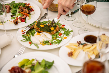 Party dinner table, celebrating with friends of family served at home or in a restaurant.