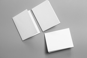 Blank portrait mock-up paper. brochure magazine isolated on gray, changeable background / white paper isolated on gray
