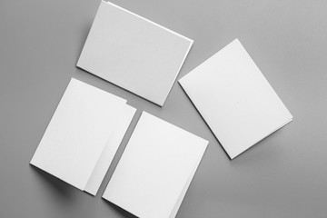 Blank portrait mock-up paper. brochure magazine isolated on gray, changeable background / white paper isolated on gray