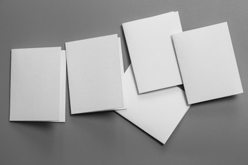 Blank portrait mock-up paper. brochure magazine isolated on gray, changeable background / white paper isolated on gray