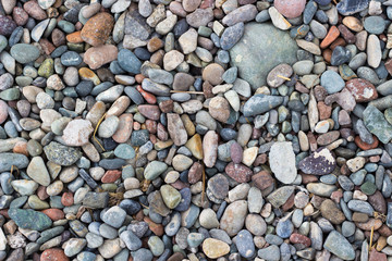 Abstract background dry round reeble stones. Texture of pebble