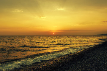 Beautiful sunset on the sea. Summer background.