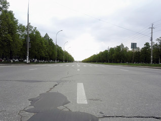 asphalt road in city going to distance