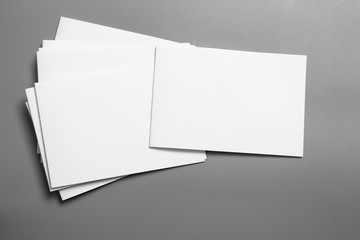 Blank portrait mock-up paper. brochure magazine isolated on gray, changeable background / white paper isolated on gray