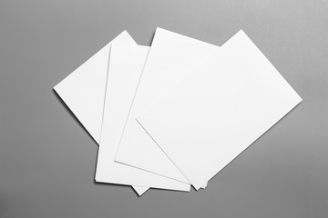 Blank portrait mock-up paper. brochure magazine isolated on gray, changeable background / white paper isolated on gray