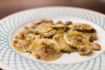 Close-up of a plate of brown butter ravioli.