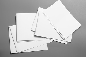 Blank portrait mock-up paper. brochure magazine isolated on gray, changeable background / white paper isolated on gray