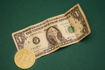 old one dollar paper money and bitcoin