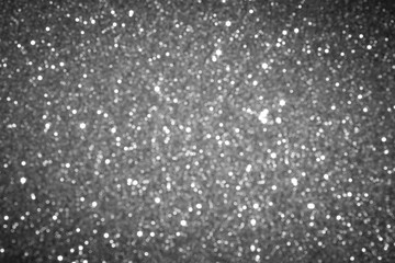 gray blur abstract background. bokeh Christmas blurred beautiful shiny Christmas lights