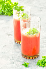 Two glasses of tomato juice homemade from garden organic vegetables