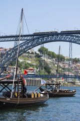 Cargo boats and the Luiz I bridge