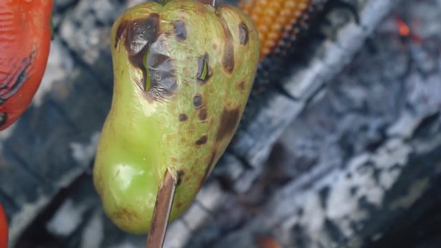 cooking pepper on fire